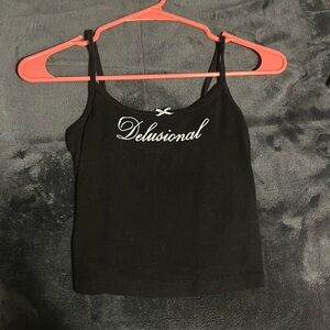 Black “Delusional” Tank Top From Garage
